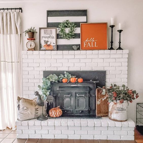 old wood stove with fall decor